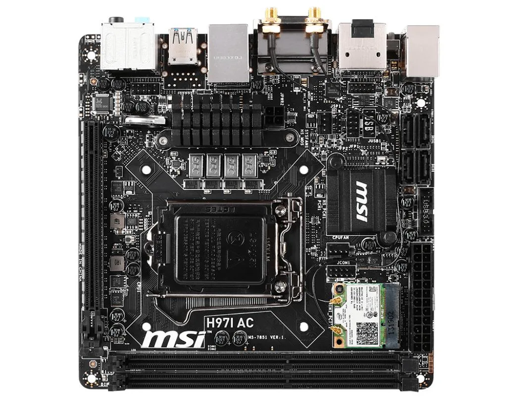 Compact Mini-ITX motherboard with dark PCB, silver heatsinks and rear I/O shield