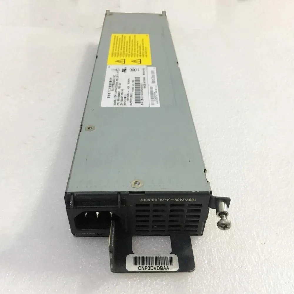 Silver rectangular ATX power supply unit with ventilation grille and label showing model numbers