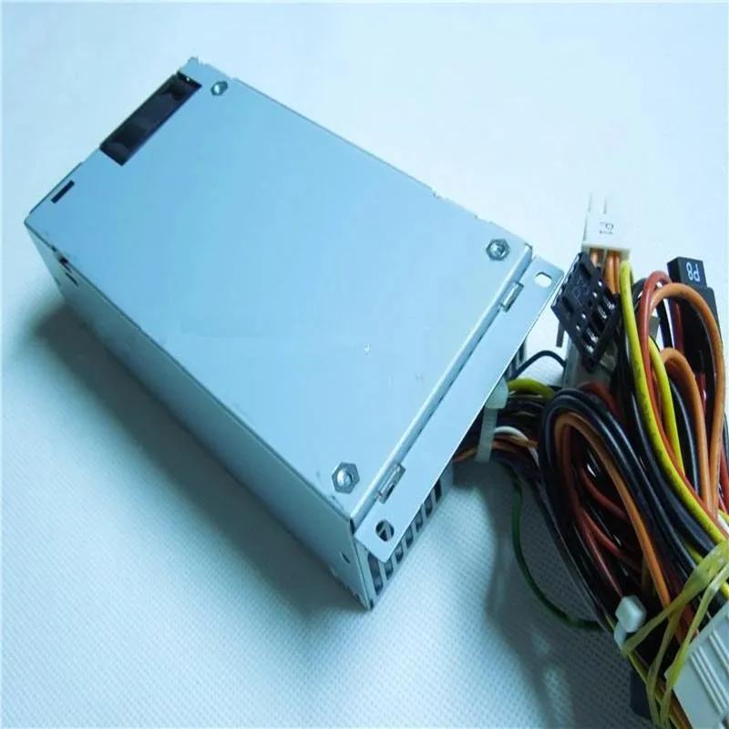 Compact silver ATX power supply unit with fan grille