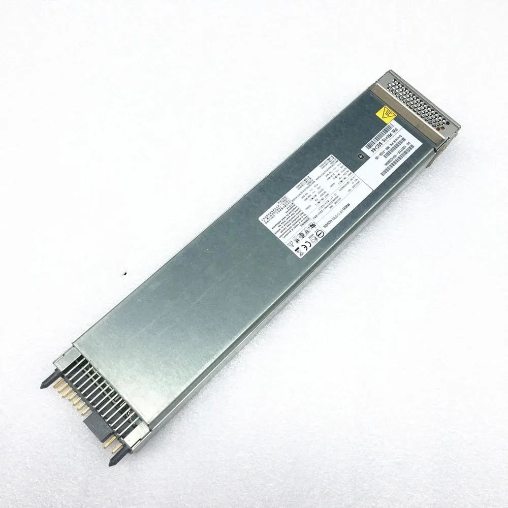 Rectangular silver ATX power supply unit with ventilation grille and label showing 12V 165A 2000W