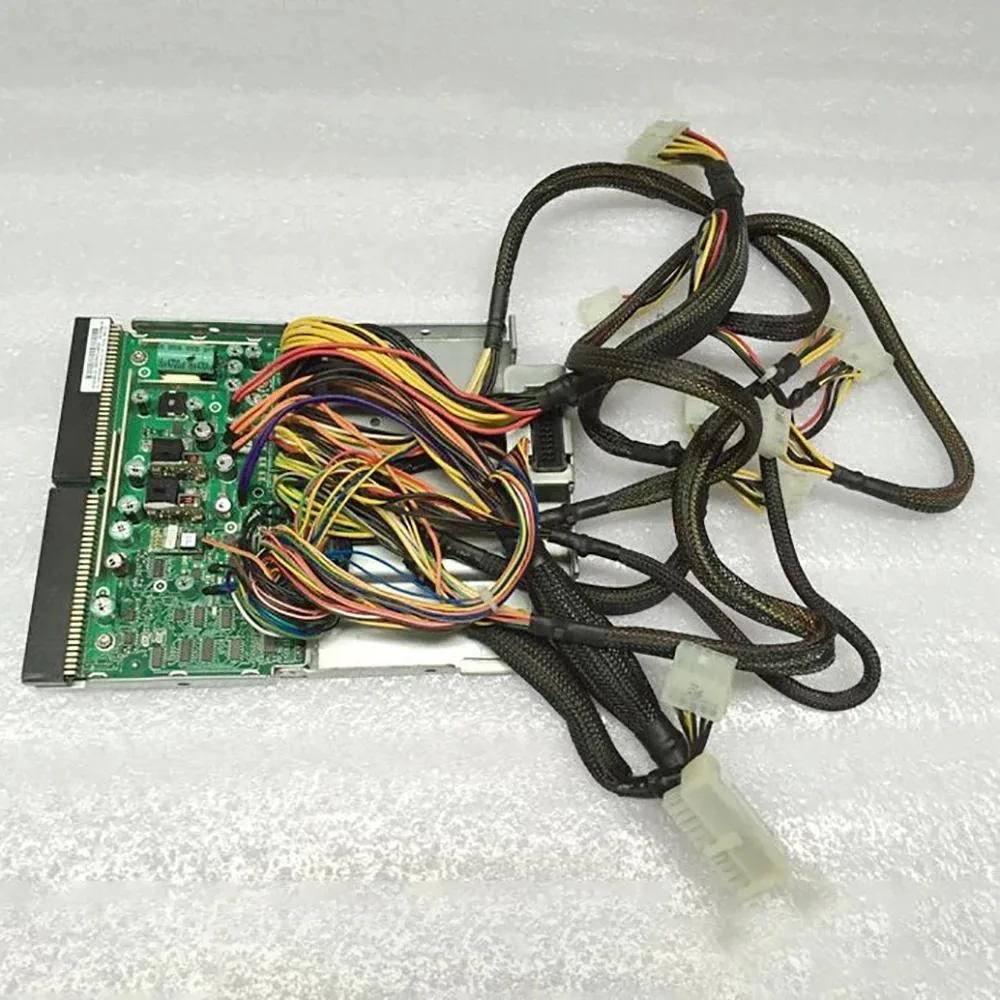 Silver rectangular ATX power supply unit with rear fan grille and power socket