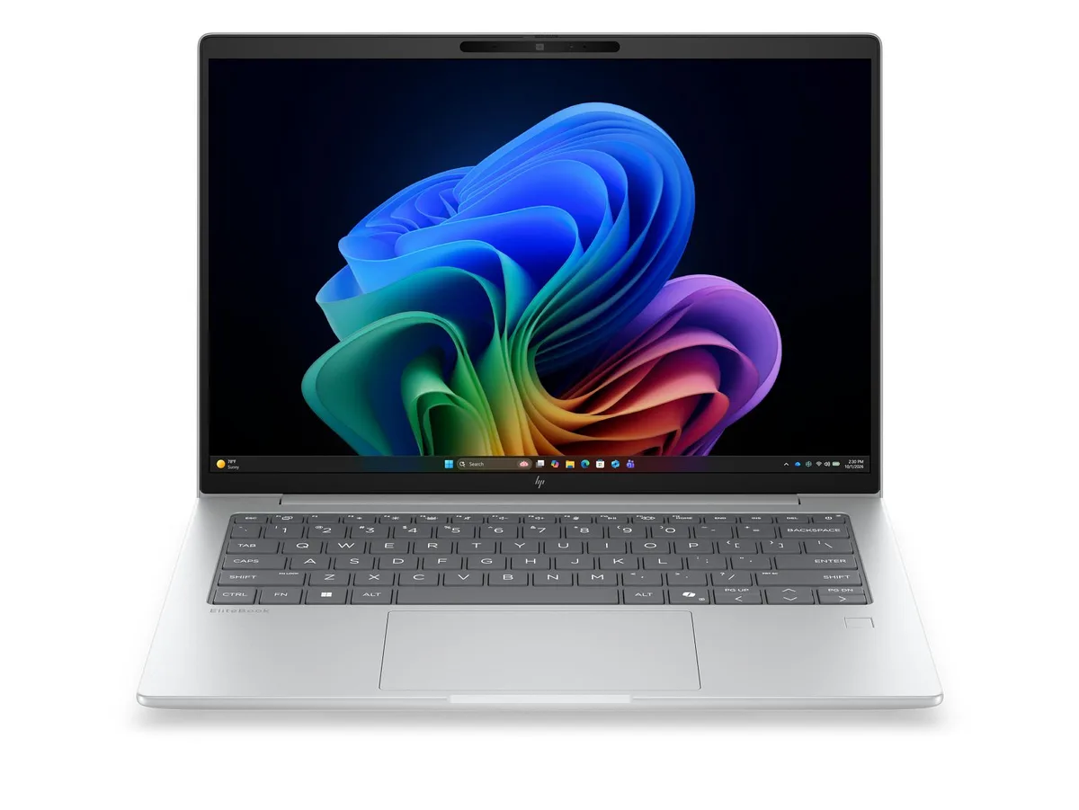Silver 14-inch laptop, thin tapered profile, matte finish