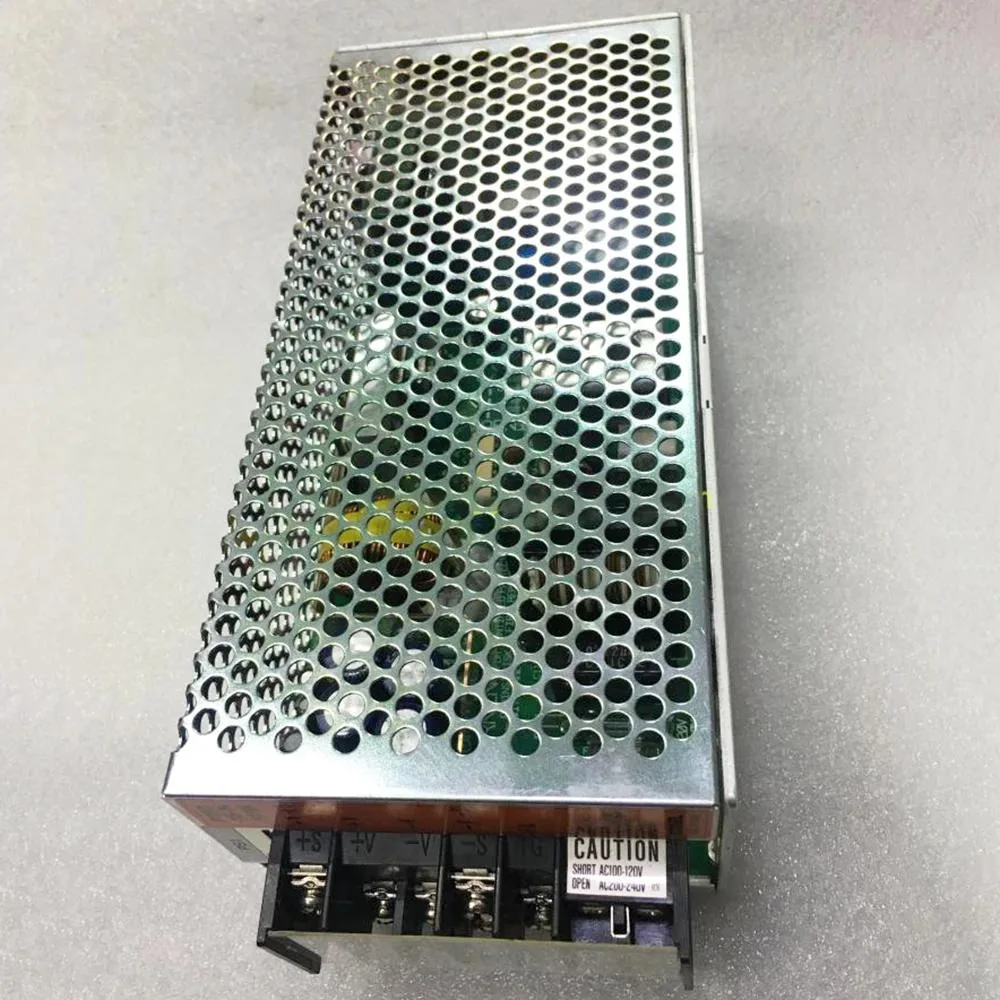 Silver rectangular ATX power supply unit with label showing 15V 10A 150W
