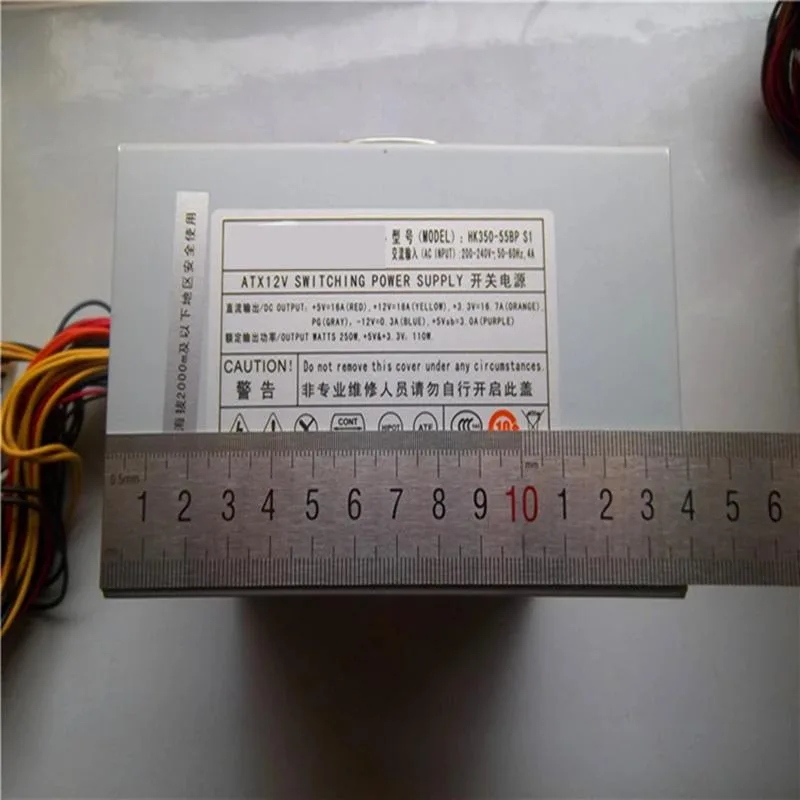 Black rectangular ATX power supply unit with ventilation grille and fan visible