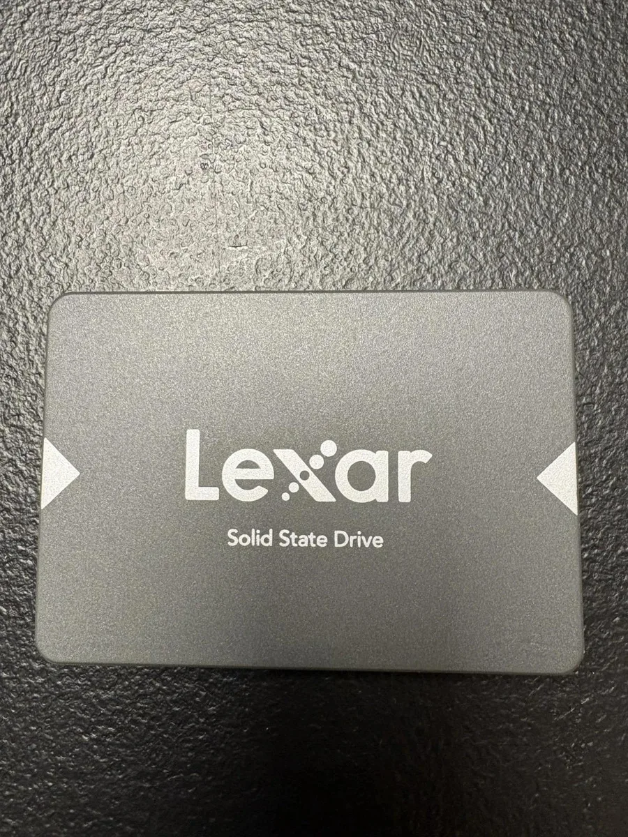 Rectangular 2.5 inch gray SSD with label showing 128GB capacity