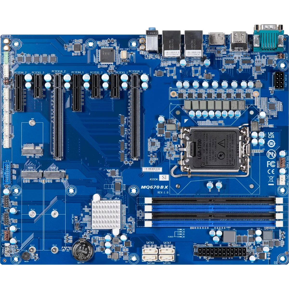 Green ATX motherboard with silver heatsinks and multiple expansion slots