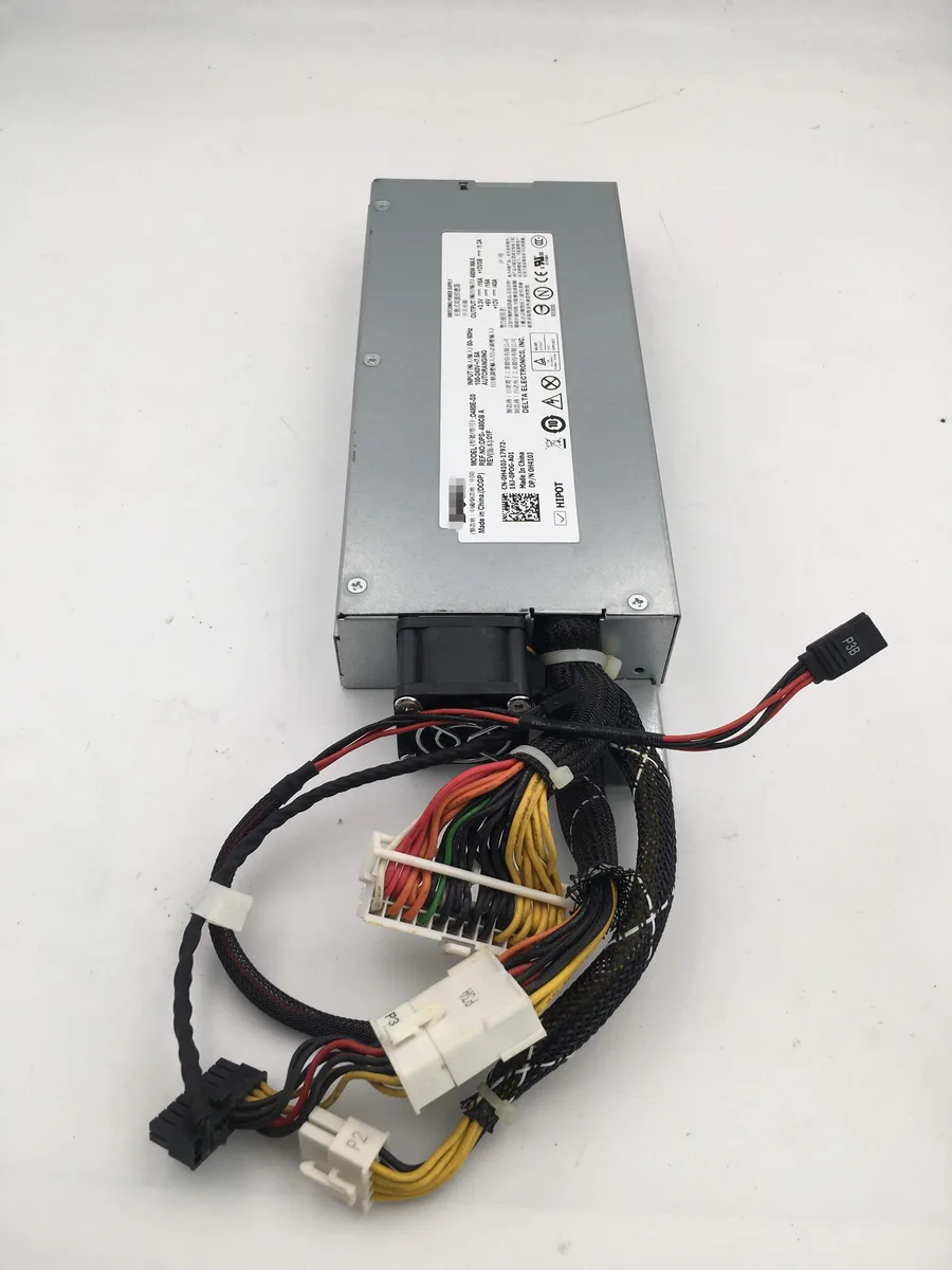 Rectangular silver server power supply unit with rear fan grille and power socket