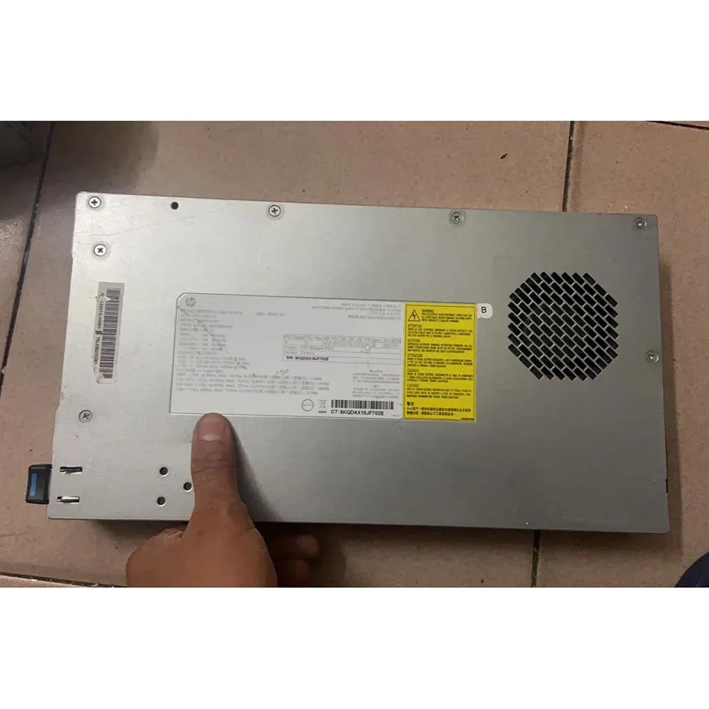 Rectangular ATX power supply unit with metal casing and ventilation grille