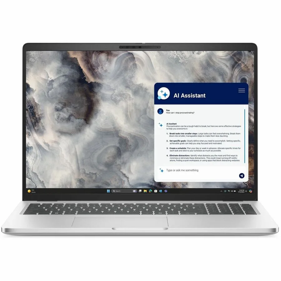 Silver 16 inch laptop closed on a light background, thin profile, Dell logo on lid