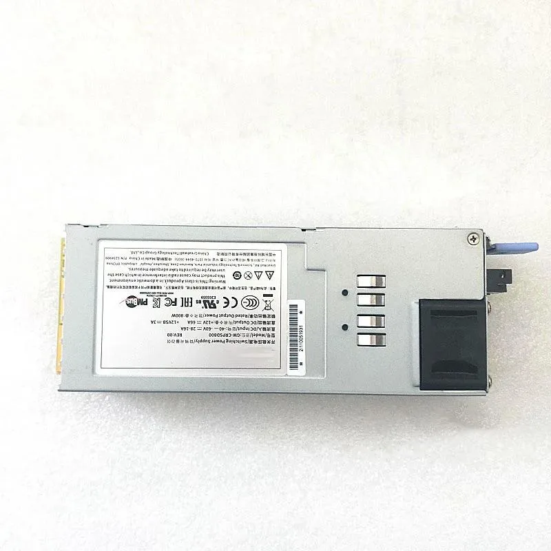 Rectangular silver power supply module with handle and connector slot