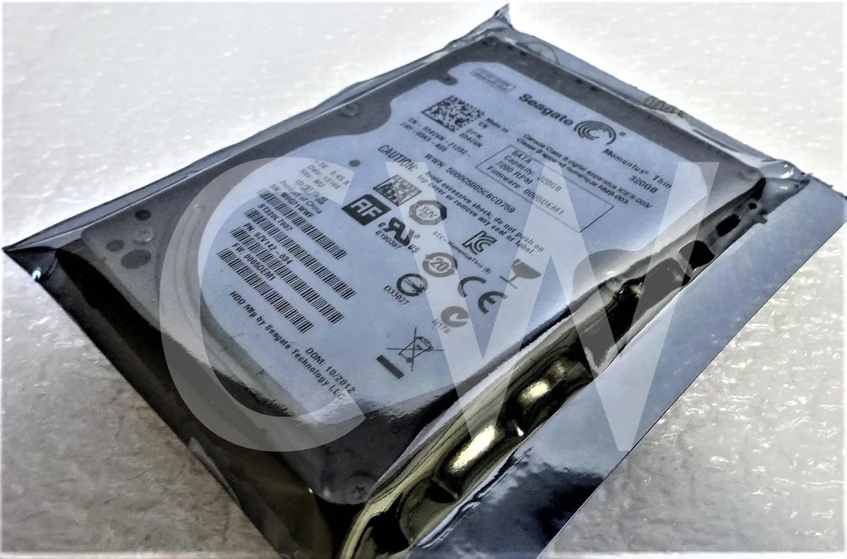 Silver rectangular 2.5 inch SATA hard drive with exposed circuit board