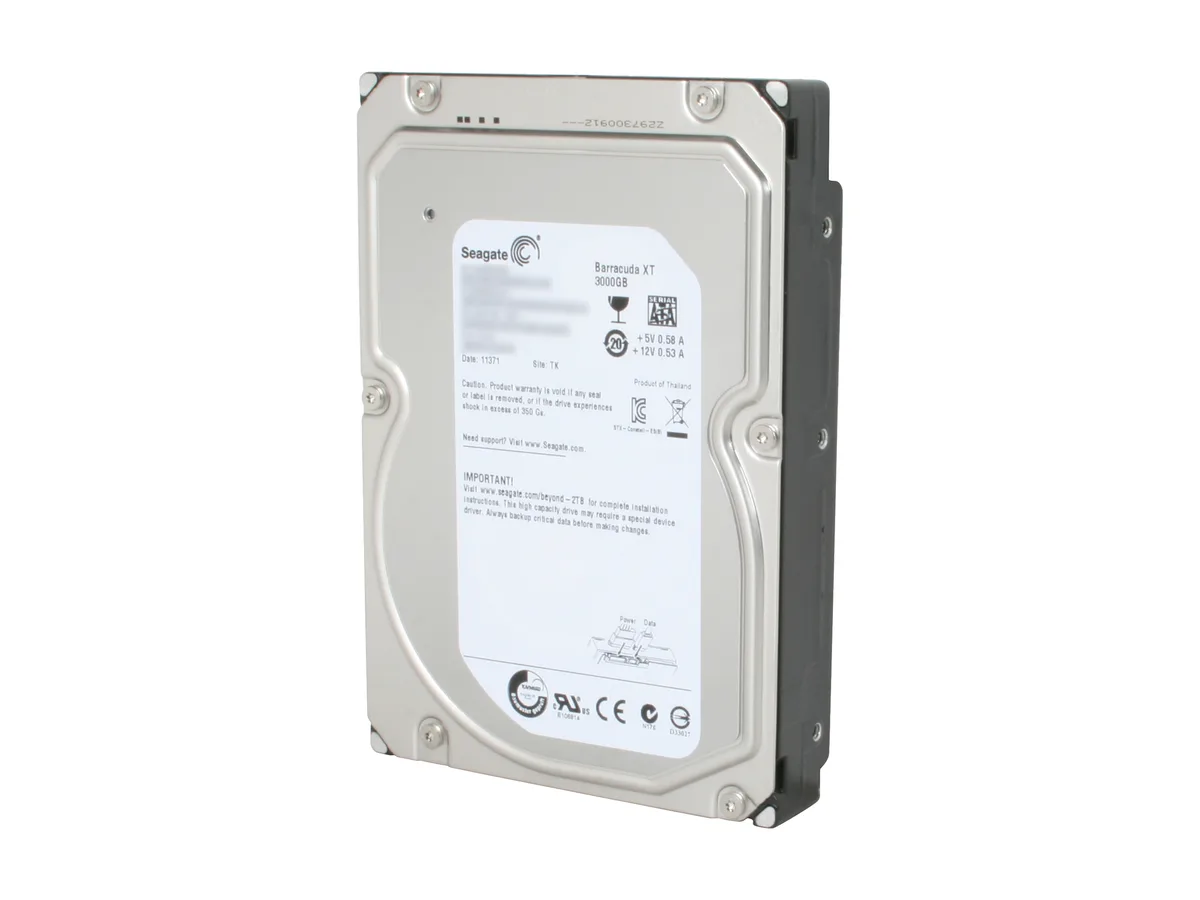 Silver 3.5 inch bare internal hard drive with circuit board visible