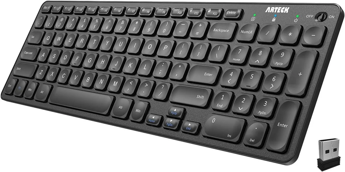 Ultra-thin full-size wireless keyboard in silver finish with numeric keypad and low-profile keys