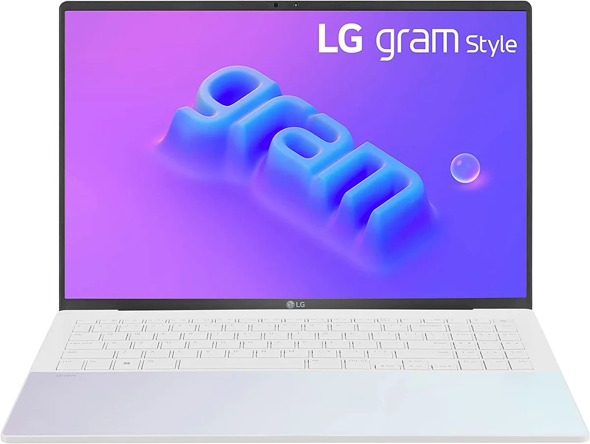 Thin white 16 inch laptop with OLED display