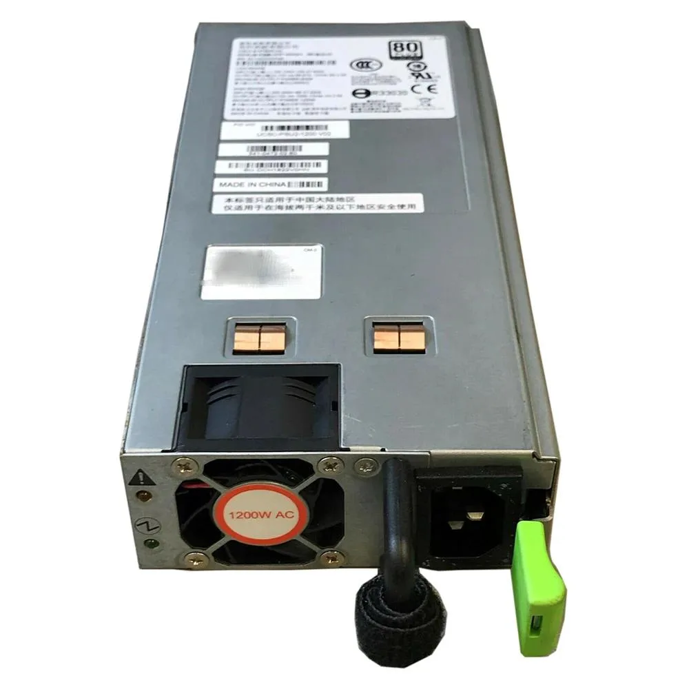 Rectangular silver metal ATX power supply unit with ventilation grille and label showing 1200W