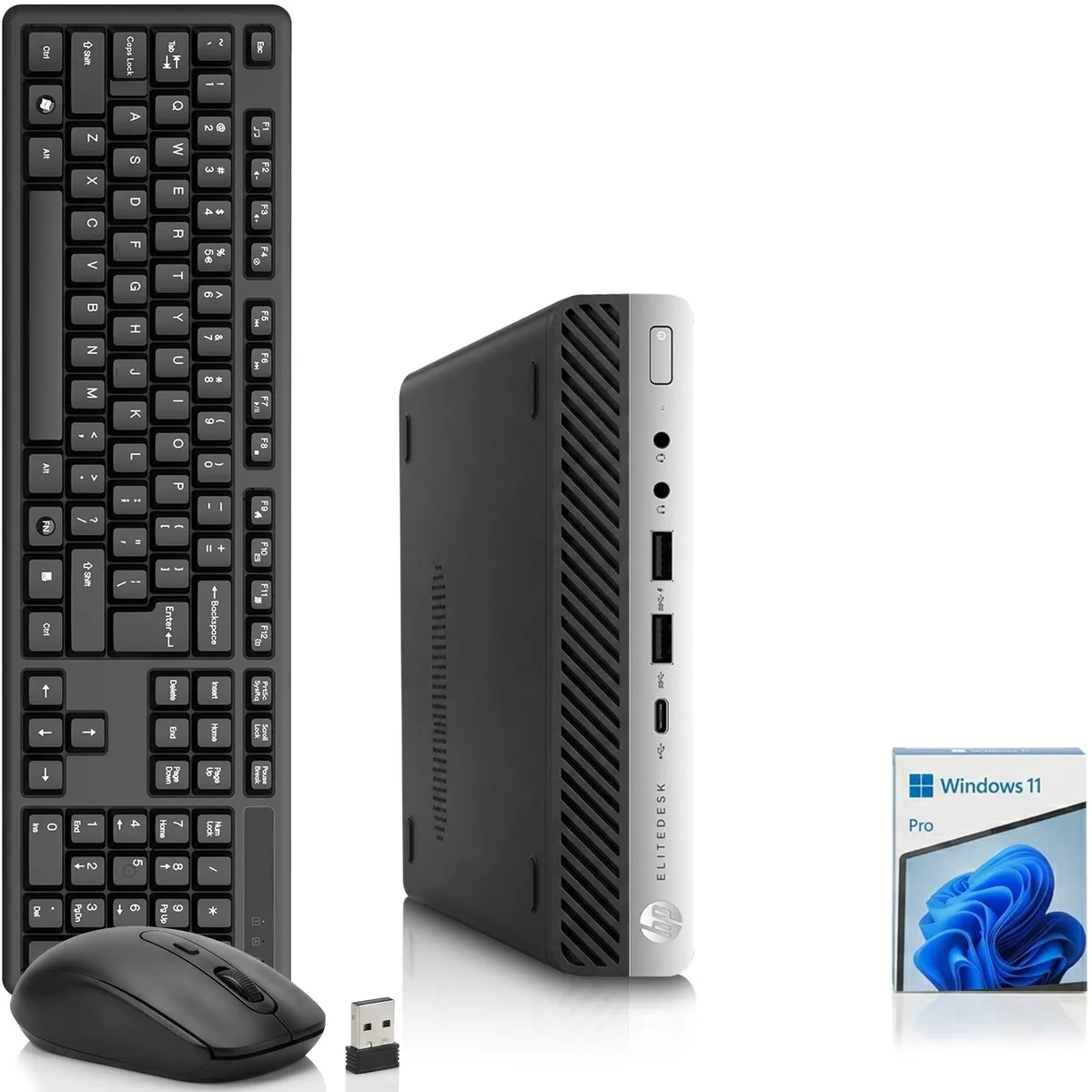 Compact silver mini desktop tower with wireless keyboard and mouse