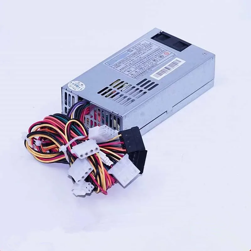 Compact 1U power supply unit in matte black metal finish with rear fan grille and side ventilation slots