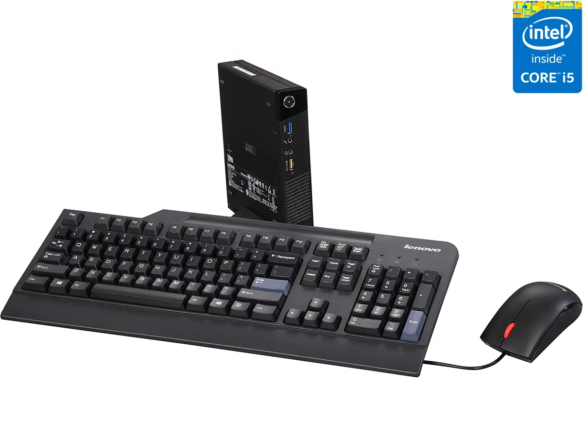 Tiny desktop in Business Black with wired keyboard and mouse