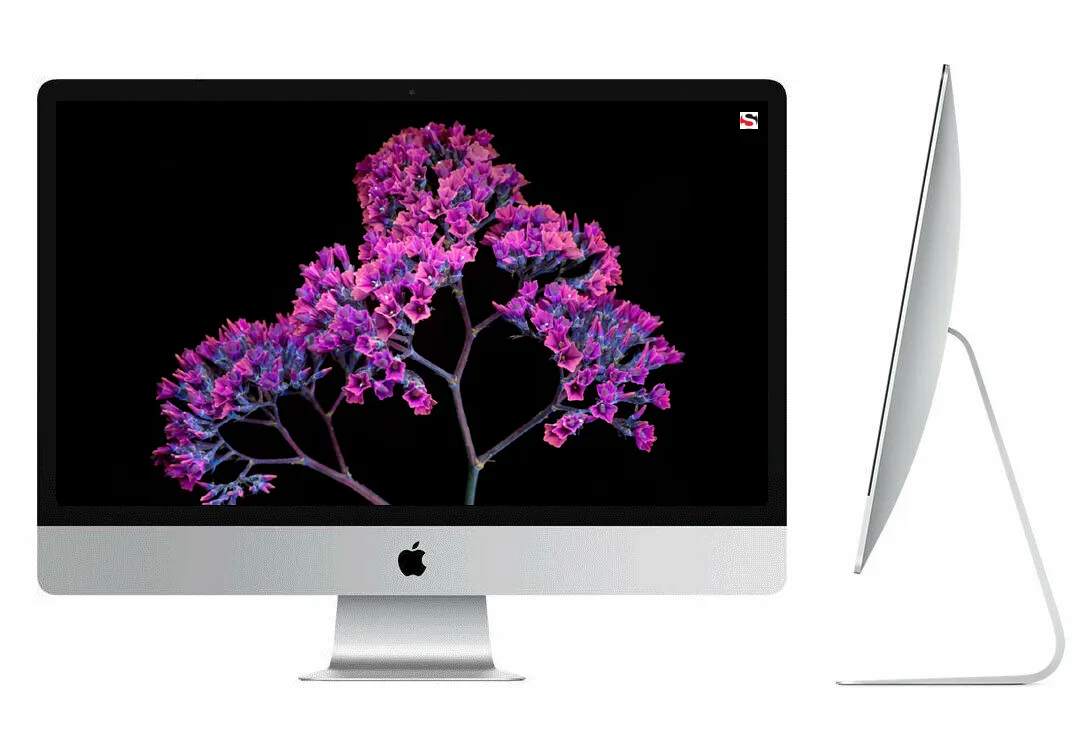 Silver aluminium all-in-one iMac with 27 inch Retina 5K display and included keyboard mouse