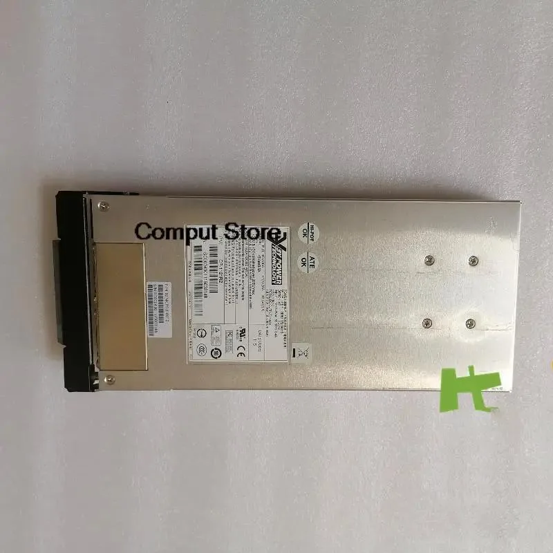Rectangular silver ATX power supply unit with ventilation grille and label showing model numbers