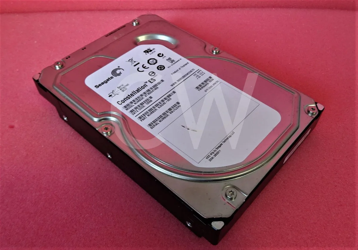 Silver 3.5 inch SAS hard drive with exposed circuit board