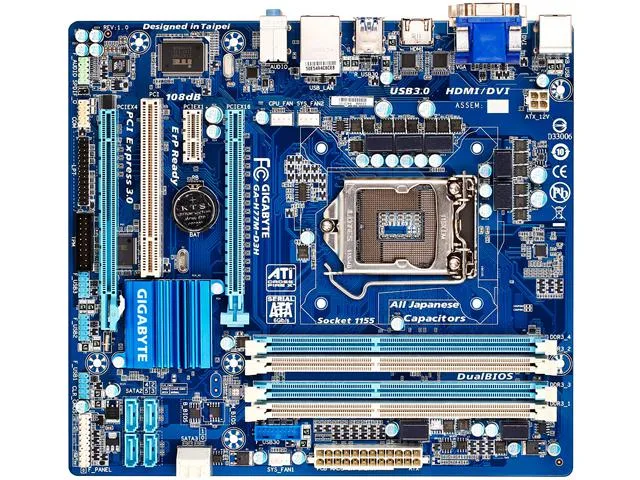 Green Micro ATX motherboard with silver heatsinks and black slots