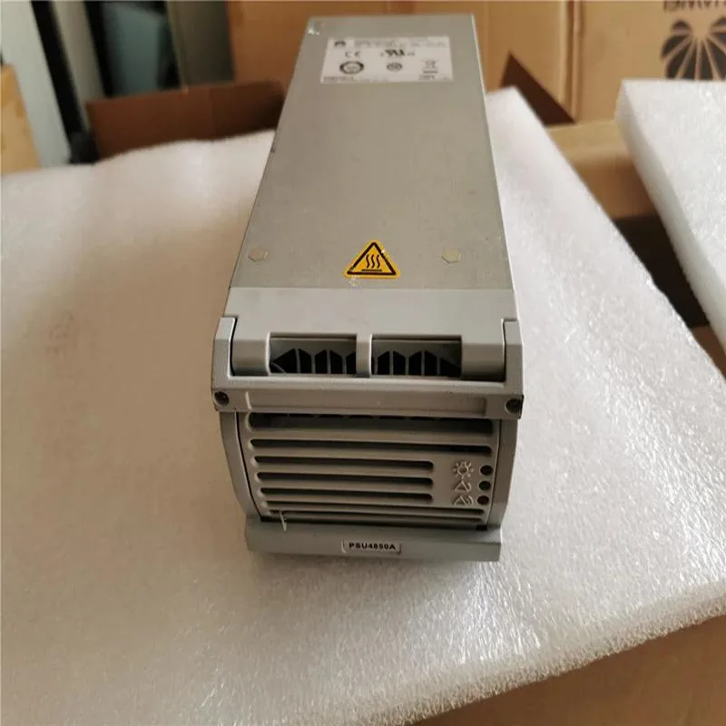 Rectangular silver ATX power supply unit with ventilation grille