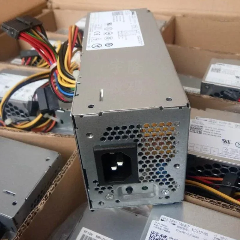 Small silver rectangular ATX power supply unit with ventilation grille and label showing 235W