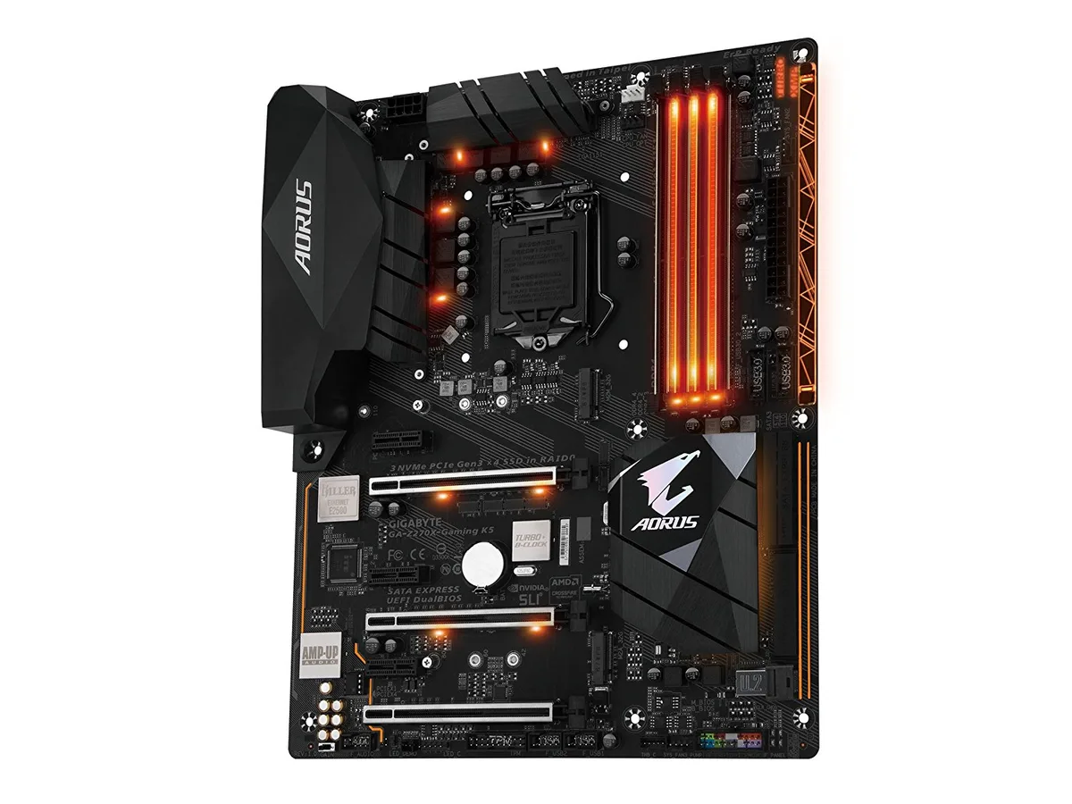 ATX motherboard with black heatsinks and orange accents