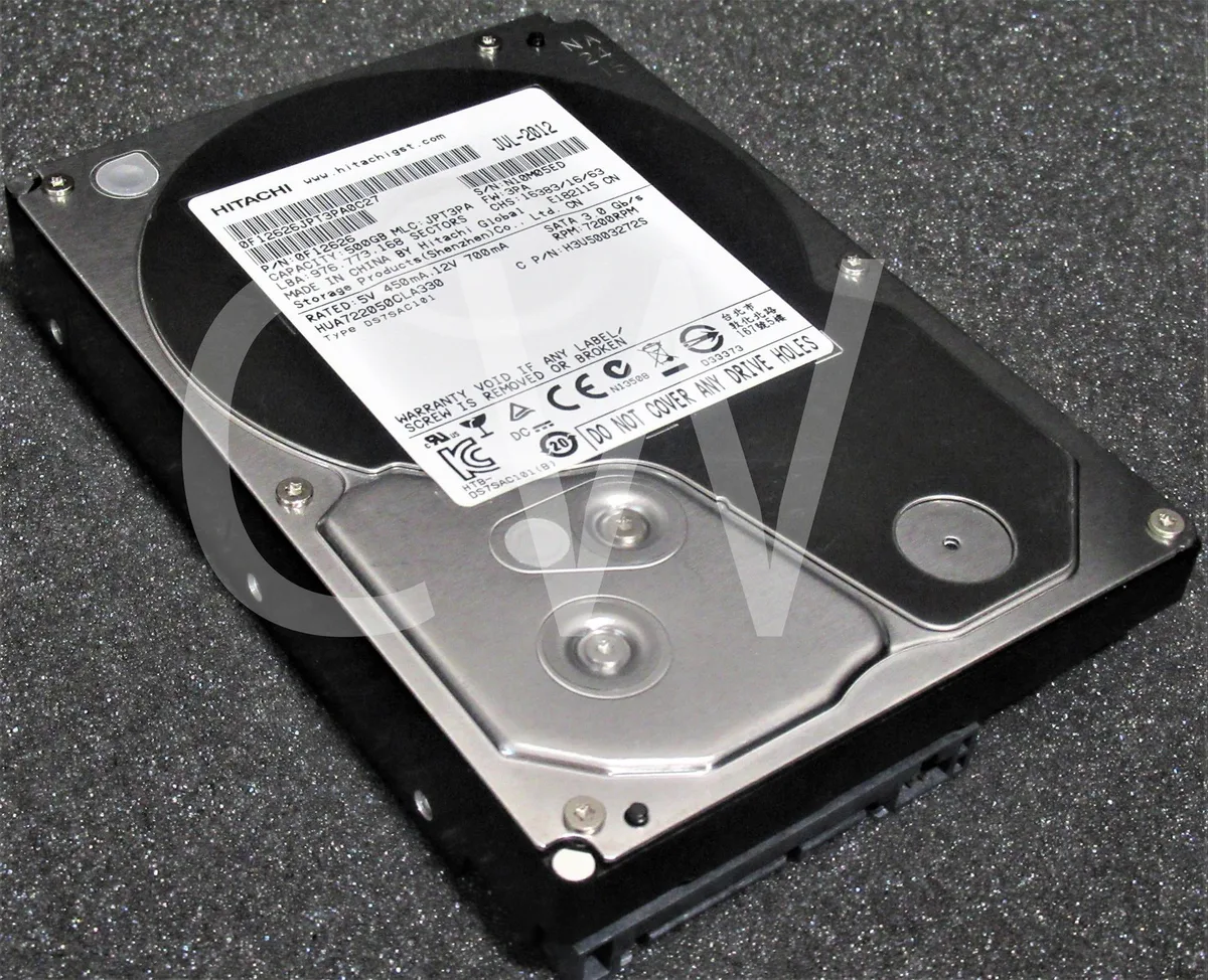Silver 3.5 inch SATA hard drive with circuit board visible