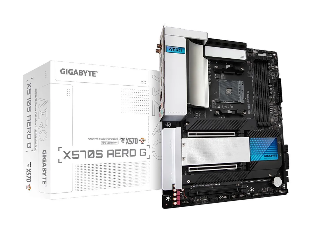 Black ATX motherboard with silver heatsinks and a rear I/O shield visible