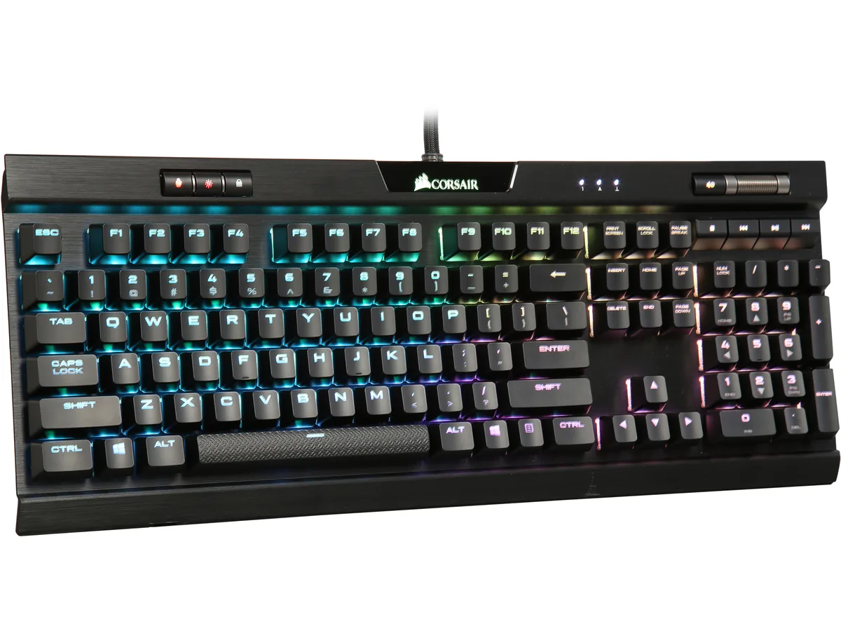 Black full-size mechanical keyboard with brushed aluminium frame, detachable wrist rest and RGB backlit keys