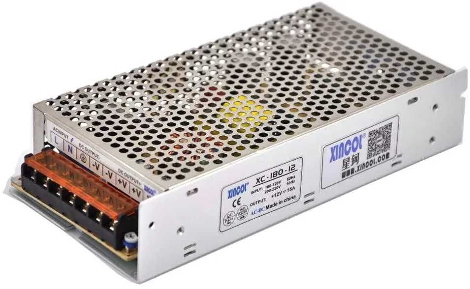 Rectangular silver metal enclosure with screw terminals and voltage selector switch