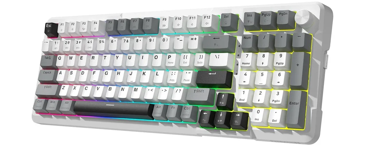White compact mechanical keyboard with volume knob and RGB backlighting
