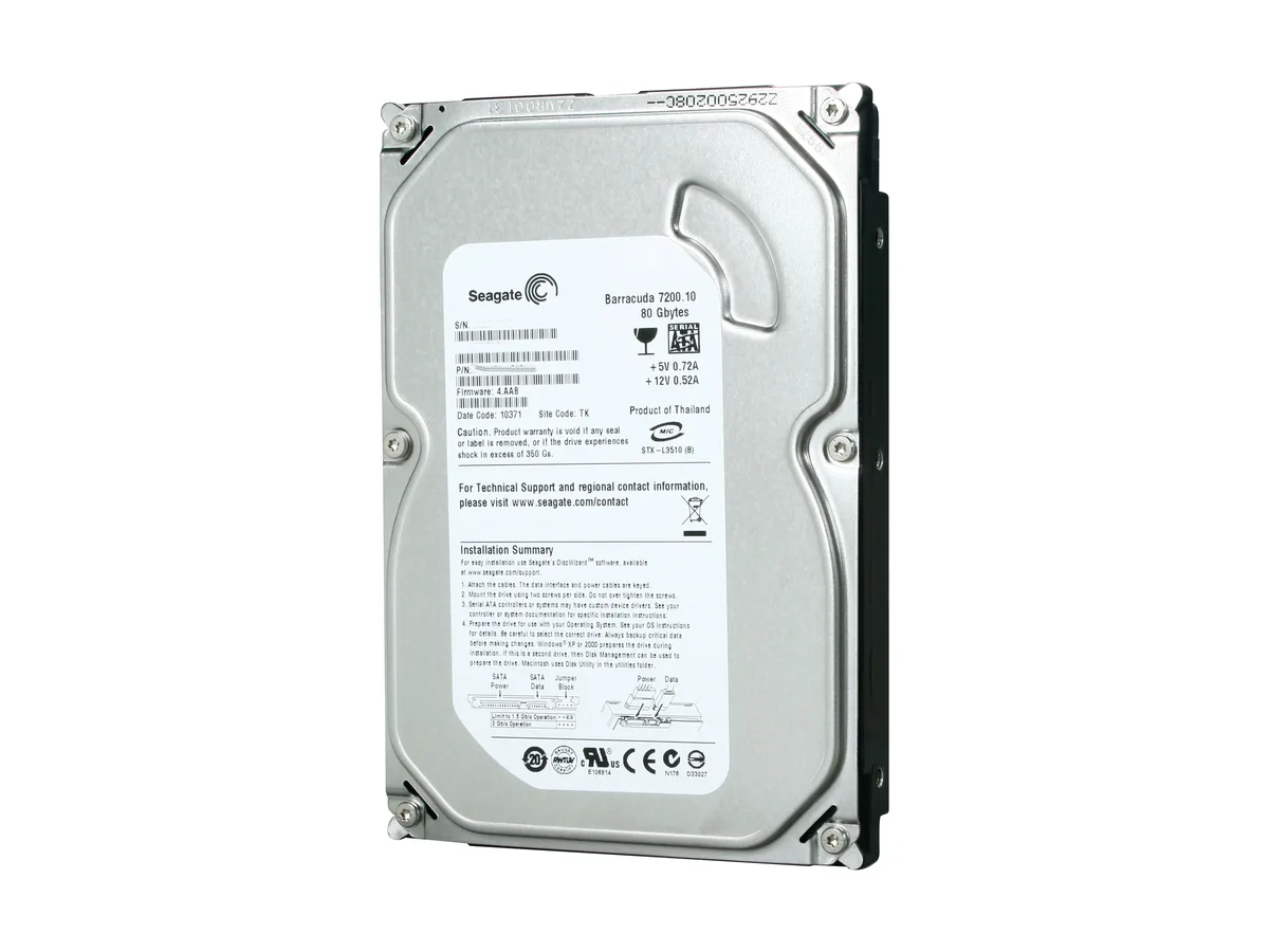 Silver 3.5 inch SATA hard drive bare drive with circuit board visible