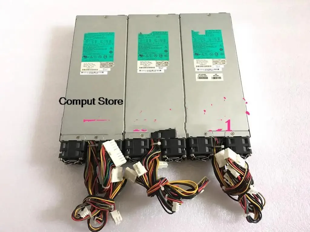Rectangular silver server power supply unit with rear fan grille and power connector