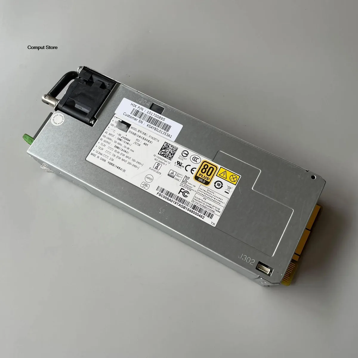 Silver rectangular server redundant power supply unit with handle and ventilation grille