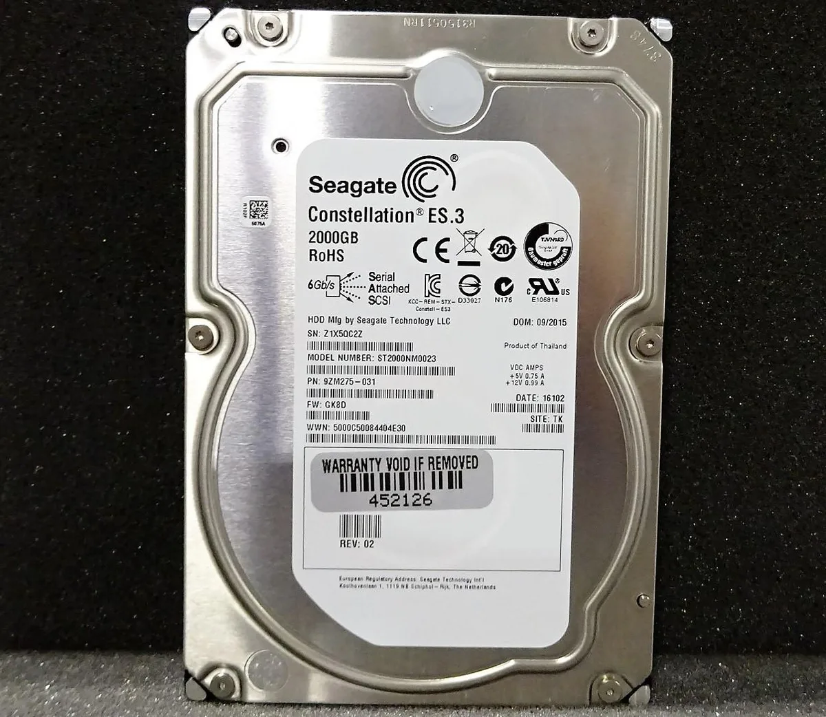 Silver 3.5 inch SAS hard drive with circuit board visible