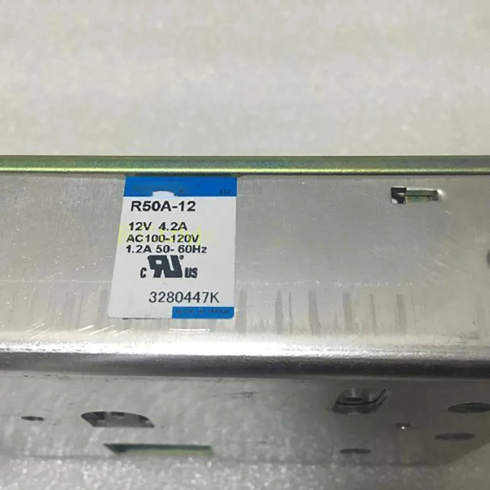 Rectangular metal switching power supply unit, silver finish, label shows 12V 4.2A 100V input