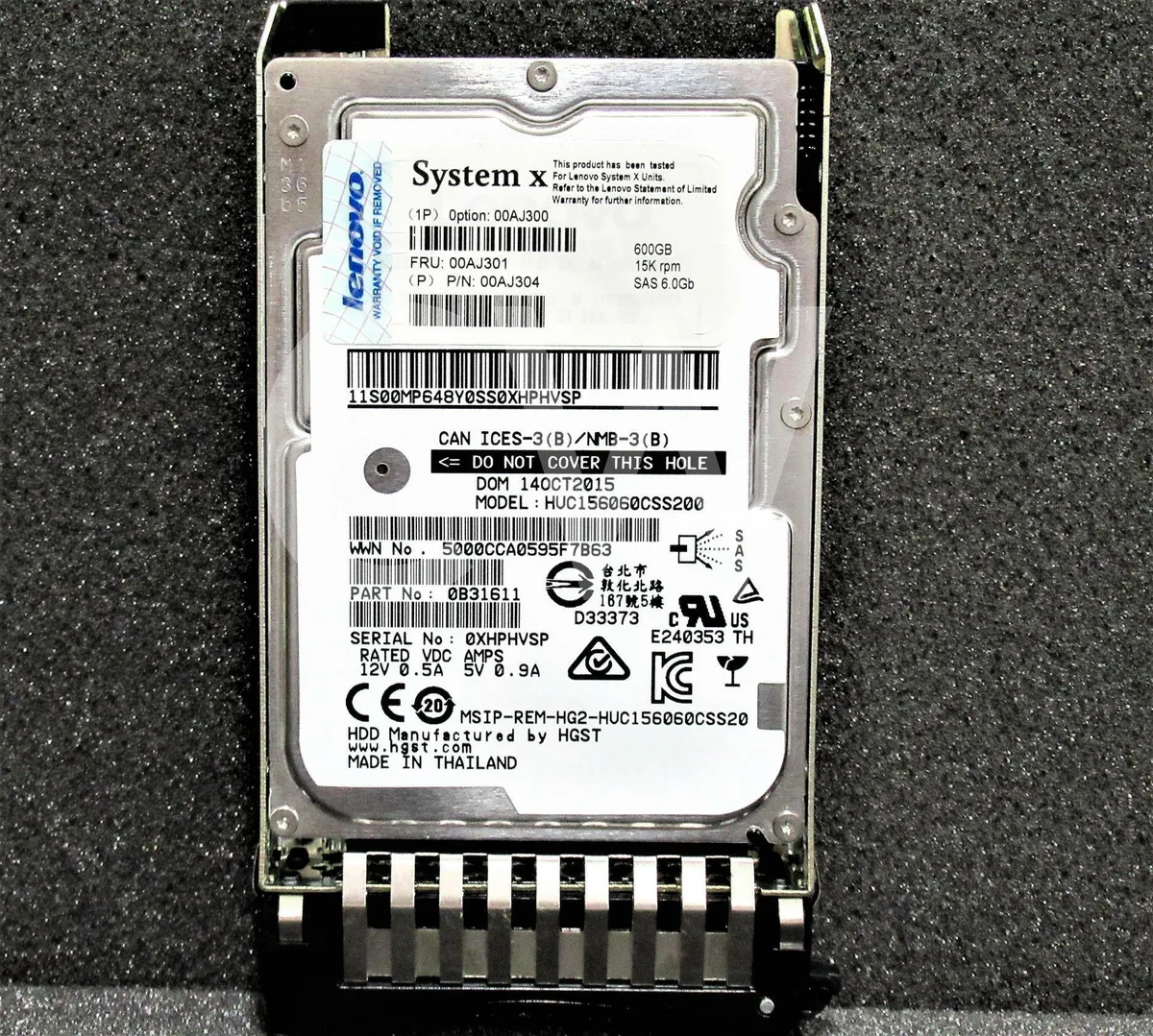 2.5 inch SAS hard drive in silver metal caddy tray