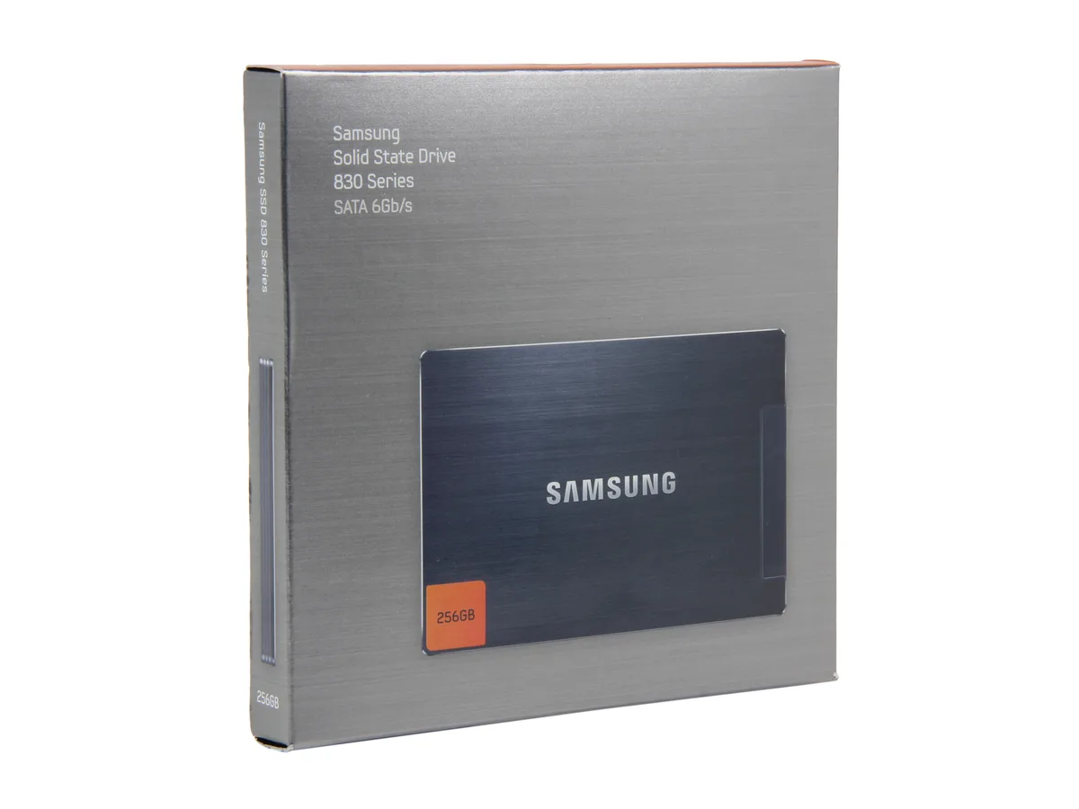 Rectangular black metal 2.5 inch SSD with label showing Samsung 830 Series 256GB
