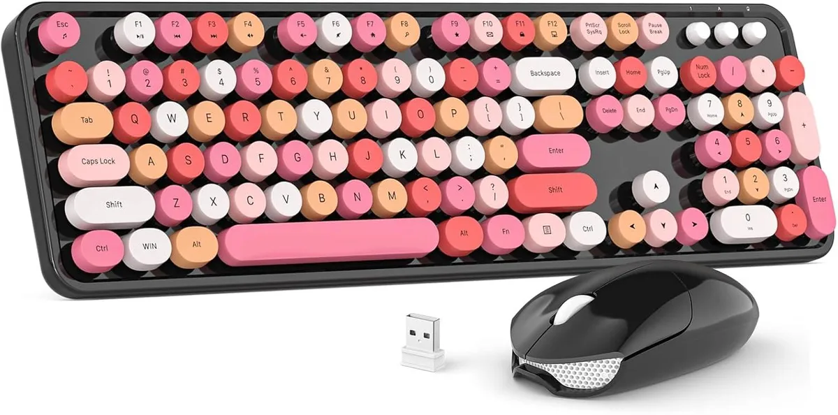 Black full-size wireless keyboard with round retro keycaps and matching mouse on a single USB receiver