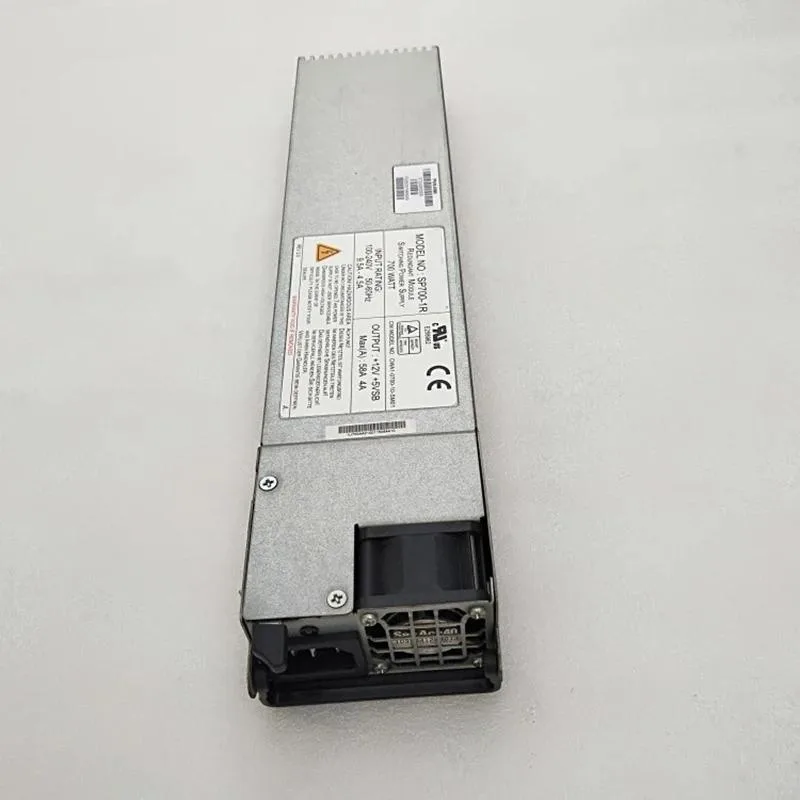 Silver 1U rackmount power supply with rear fan grille and modular cable sockets