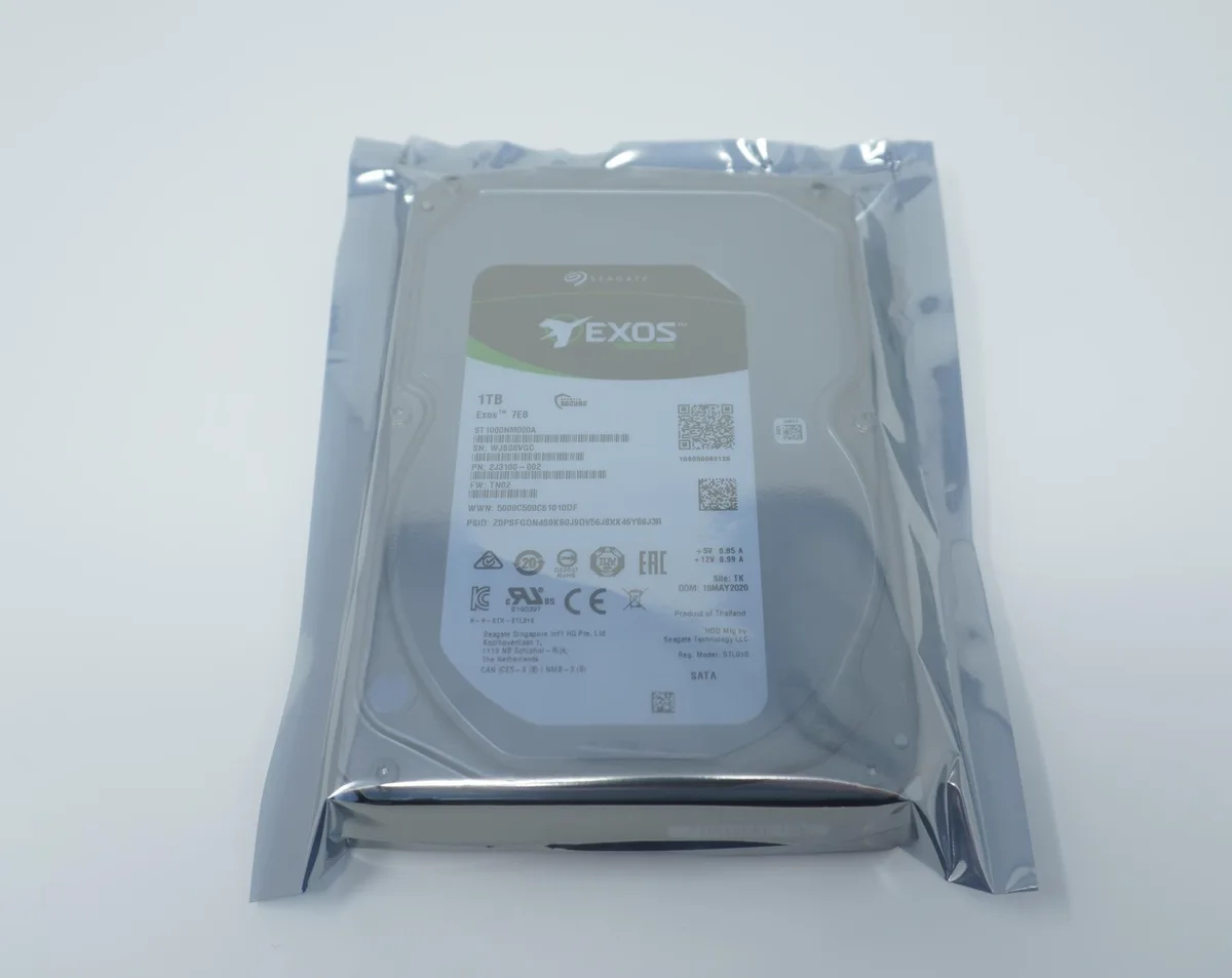 Silver 3.5 inch SATA hard drive with exposed circuit board