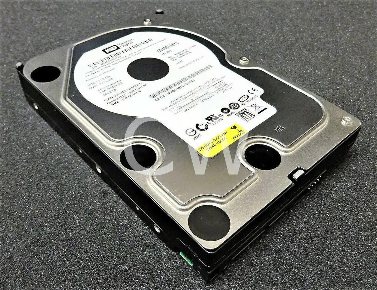 Silver rectangular 3.5 inch SATA hard drive with circuit board visible underneath
