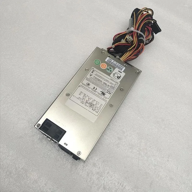 Compact 1U ATX power supply unit with matte metal finish and rear fan grille