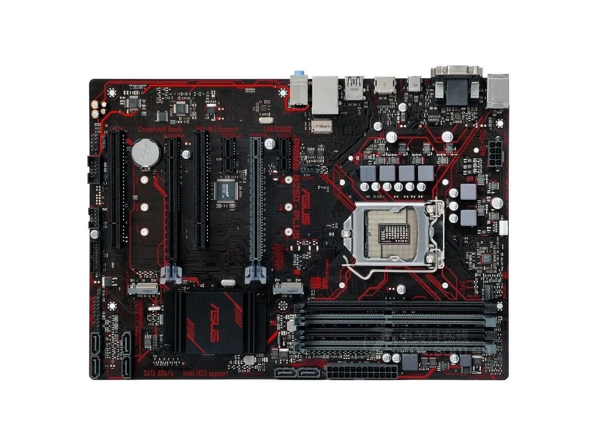 Green ATX motherboard with silver heatsinks and black slots