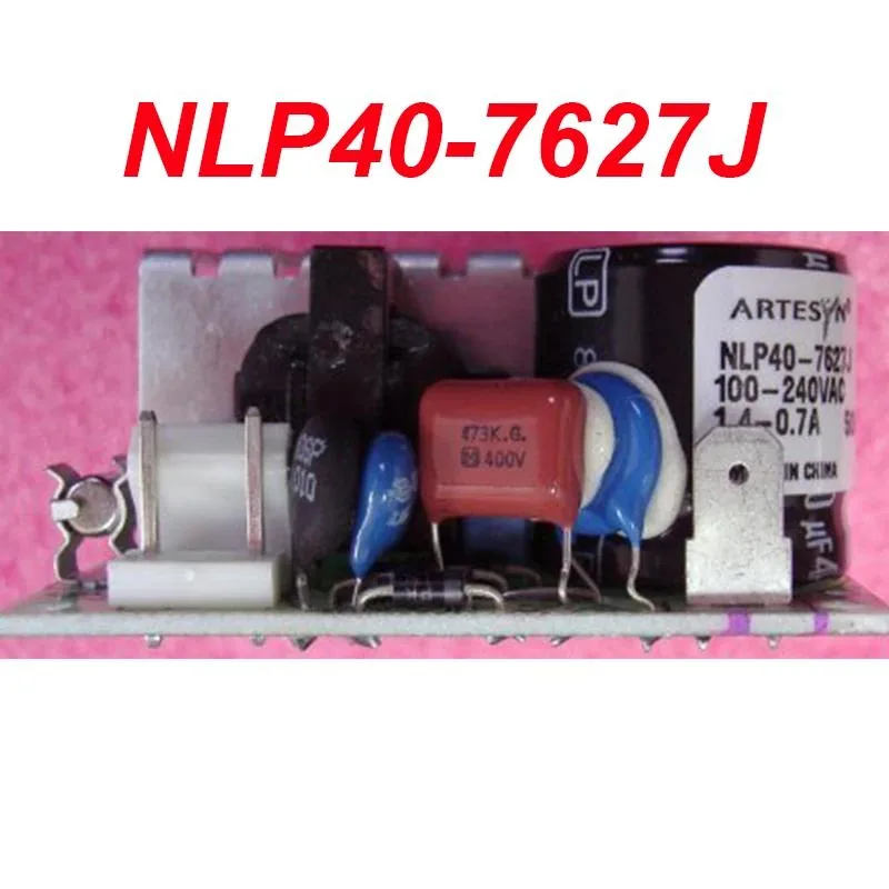 KHACHIMO NLP40-7627J ATX power supply unit, rectangular metal casing with ventilation grille