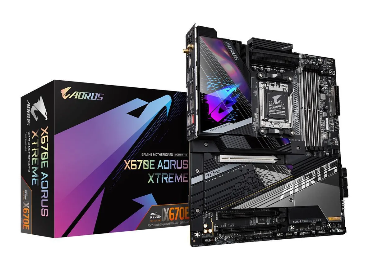 Large rectangular EATX motherboard with dark metallic heatsinks and silver accents