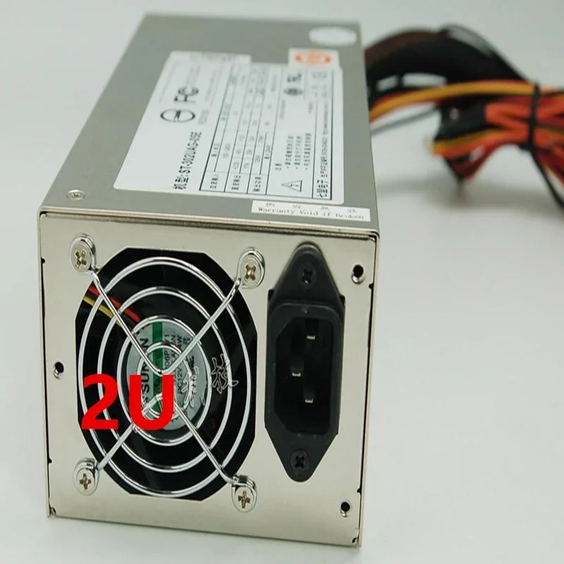 Silver rectangular ATX power supply unit with fan grille and power socket visible